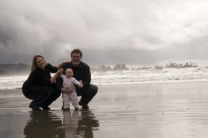 At a Tofino beach with baby and family 