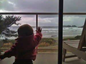 standing at tofino hotel for families with a kid-friendly window
