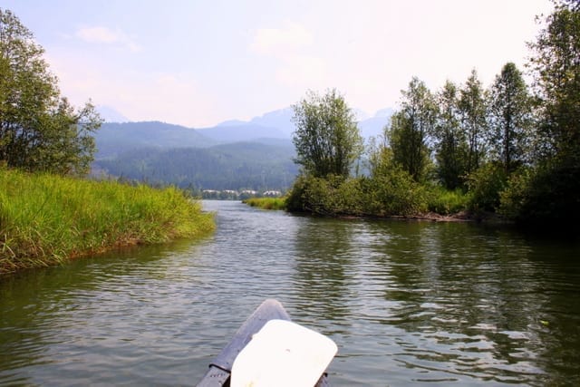 Family canoe trip along River of Golden Dreams