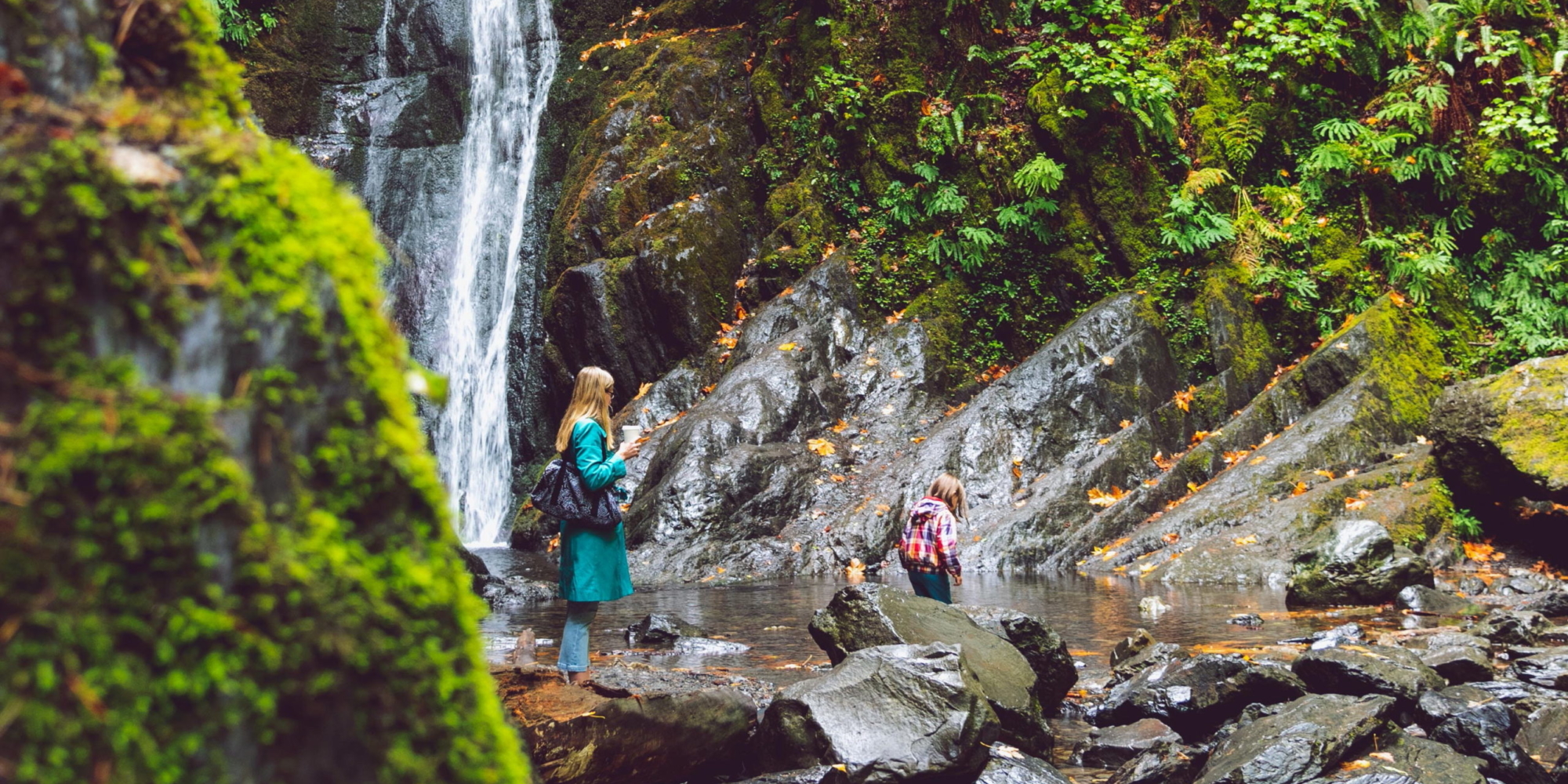 woman rock waterfall oregon hike